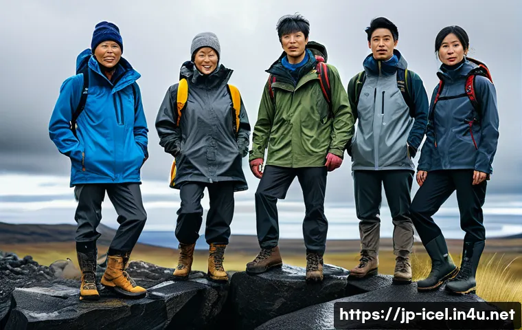 아이슬란드 날씨 변화 대비법 - A group of Japanese tourists dressed in layered outdoor clothing including waterproof jackets, fleec...